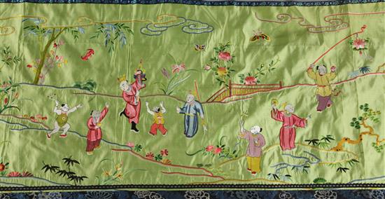 A Chinese embroidered silk wall hanging, early 20th century, 256 x 57cm